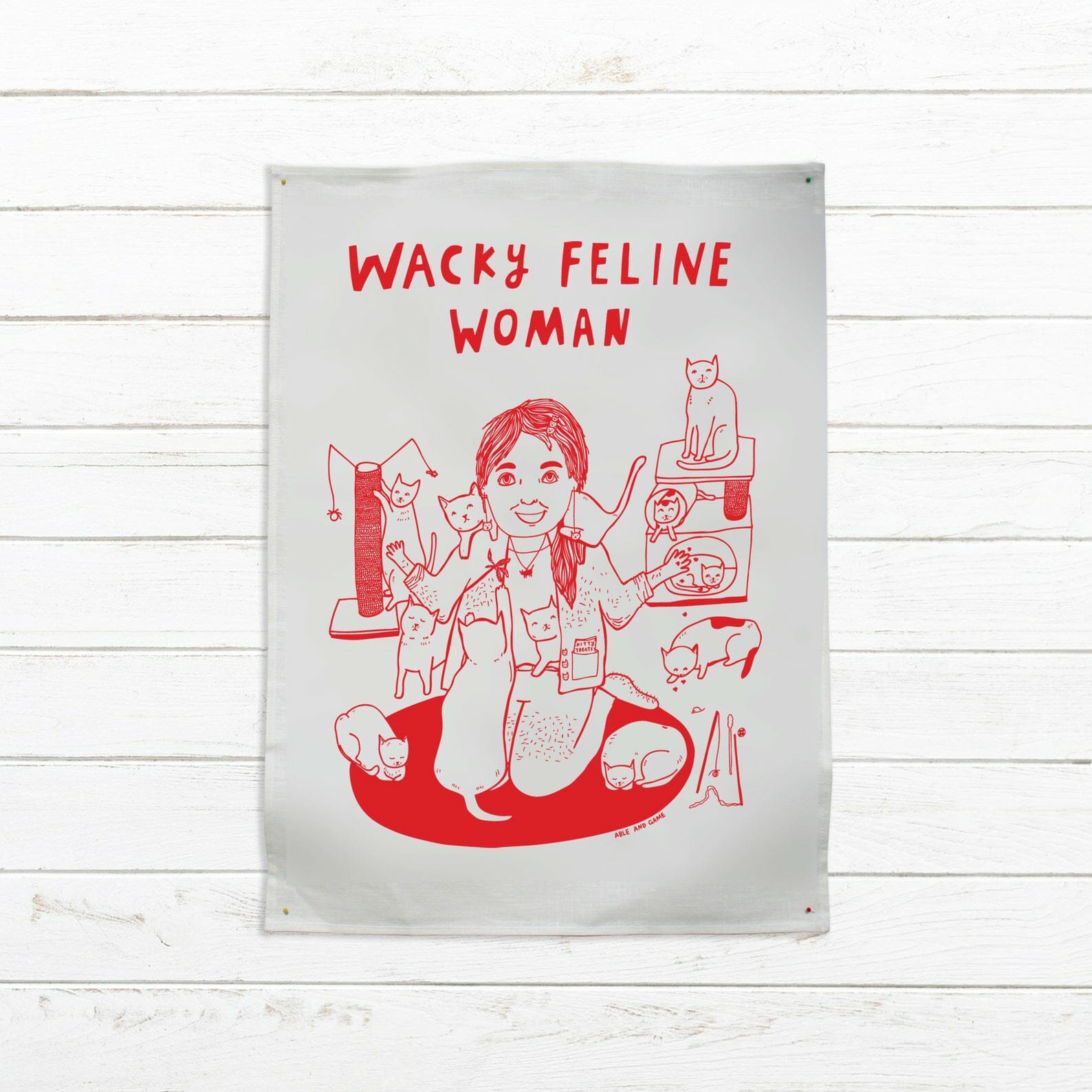 wacky feline woman tea towel